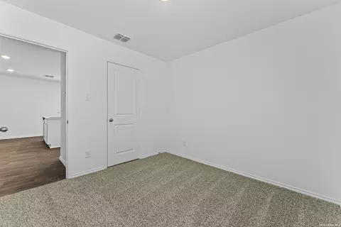 Bedroom - 15507 Mint Patch Mdw, Von Ormy, TX 78073 photo 4 of 6