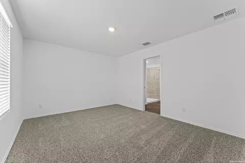 Bedroom - 15507 Mint Patch Mdw, Von Ormy, TX 78073 photo 5 of 6
