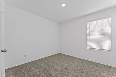 Bedroom - 15507 Mint Patch Mdw, Von Ormy, TX 78073 photo 3 of 6