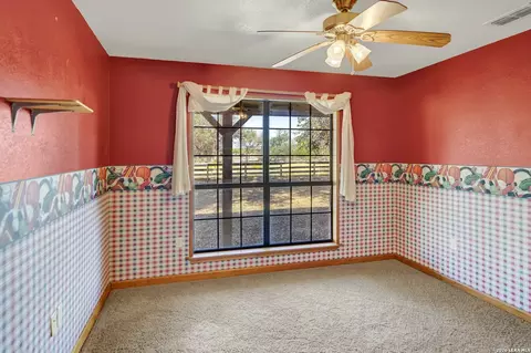 Bedroom - 386 County Road 763, Devine, TX 78016 photo 2 of 7