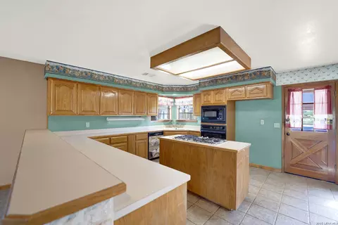 Kitchen - 386 County Road 763, Devine, TX 78016 photo 2 of 6