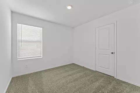 Bedroom - 15427 Mint Patch Mdw, Von Ormy, TX 78073 photo 3 of 6