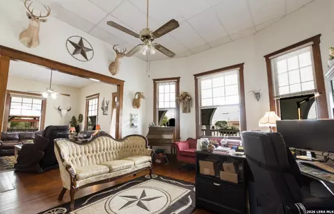Living - 110 W Benton Ave, Devine, TX 78016 photo 1 of 1