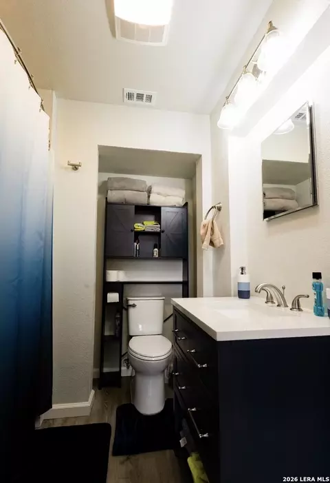 Bath - 110 W Benton Ave, Devine, TX 78016 photo 1 of 3