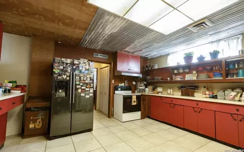 Kitchen - 110 W Benton Ave, Devine, TX 78016 photo 1 of 2