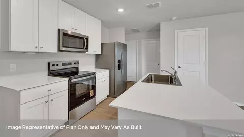 Kitchen - 303 Windflower Cv, Luling, TX 78648 photo 2 of 3