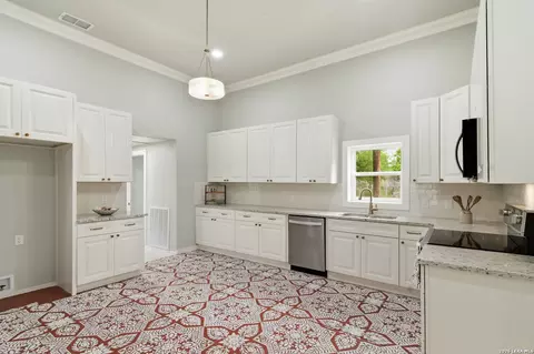 Kitchen - 309 E Houston St, Knippa, TX 78870 photo 1 of 3