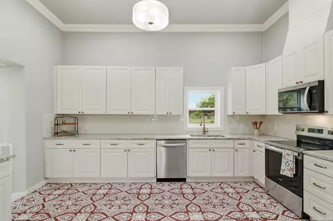 Kitchen - 309 E Houston St, Knippa, TX 78870 photo 3 of 3