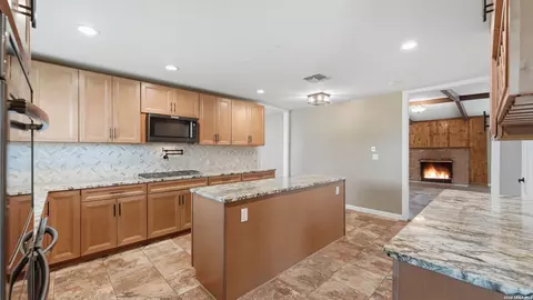 Kitchen - 106 County Road 6611, Devine, TX 78016 photo 2 of 3