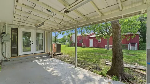 Exterior - 106 County Road 6611, Devine, TX 78016 photo 5 of 6