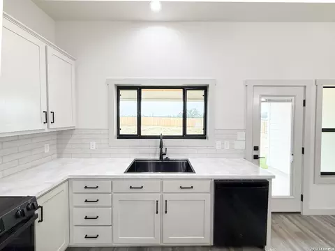 Kitchen - 1206 Devine Dr, Devine, TX 78016 photo 5 of 6