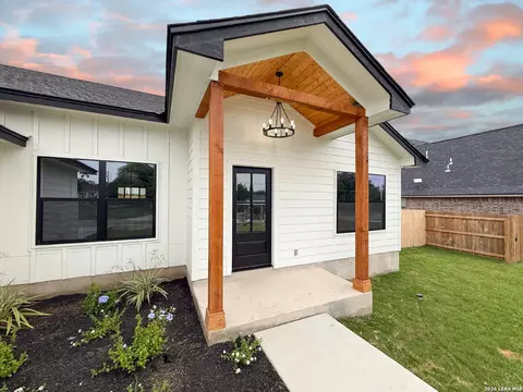 Exterior - 1206 Devine Dr, Devine, TX 78016 photo 4 of 9