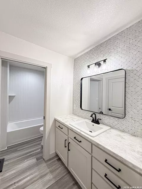 Bath - 1206 Devine Dr, Devine, TX 78016 photo 1 of 6