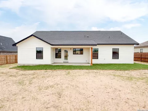 Exterior - 1206 Devine Dr, Devine, TX 78016 photo 7 of 9