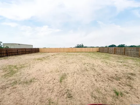 Exterior - 1206 Devine Dr, Devine, TX 78016 photo 8 of 9