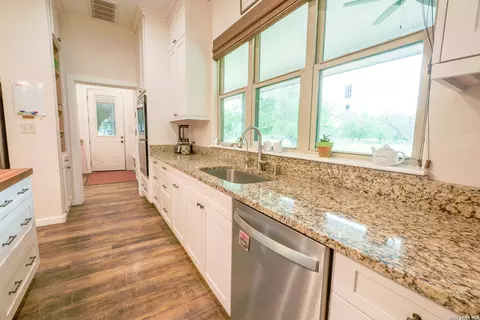 Kitchen - 1407 County Road 761, Devine, TX 78016 photo 4 of 5