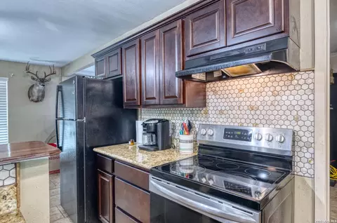 Kitchen - 208 Pulliam St, Uvalde, TX 78801 photo 4 of 4