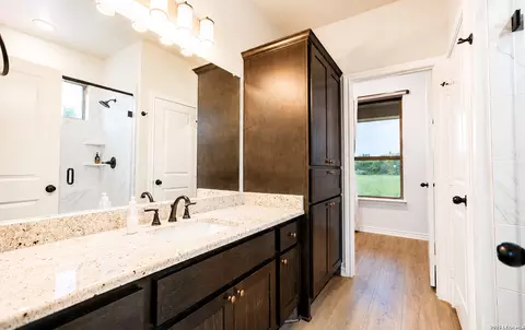 Bath - 3137 County Road 5710, Devine, TX 78016 photo 1 of 3