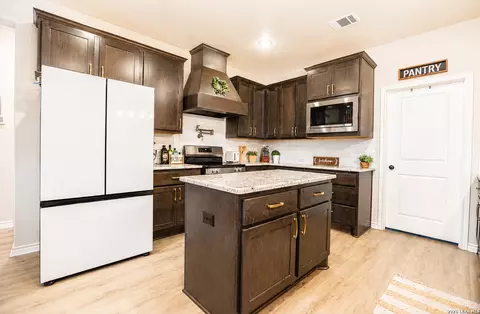 Kitchen - 3137 County Road 5710, Devine, TX 78016 photo 1 of 2
