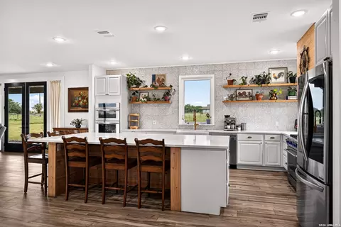 Kitchen - 965 County Road 7611, Devine, TX 78016 photo 2 of 4