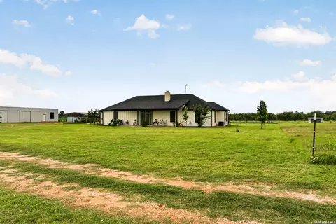 Exterior - 965 County Road 7611, Devine, TX 78016 photo 3 of 8