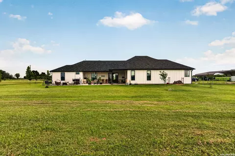 Exterior - 965 County Road 7611, Devine, TX 78016 photo 5 of 8