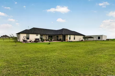 Exterior - 965 County Road 7611, Devine, TX 78016 photo 4 of 8