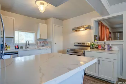Kitchen - 303 Lee Dr, Devine, TX 78016 photo 2 of 3