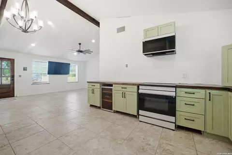 Kitchen - 909 County Road 669, Devine, TX 78016 photo 2 of 2