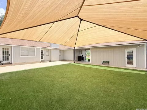 Exterior - 401 Bluebonnet Ave, Devine, TX 78016 photo 9 of 12