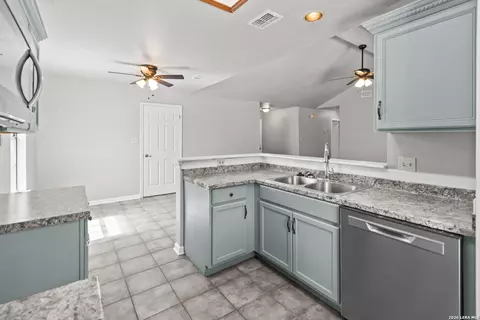 Kitchen - 302 Bain Dr, Devine, TX 78016 photo 1 of 2
