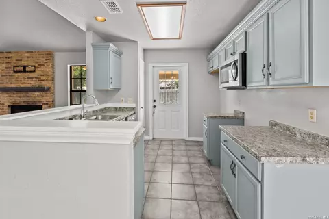Kitchen - 302 Bain Dr, Devine, TX 78016 photo 2 of 2