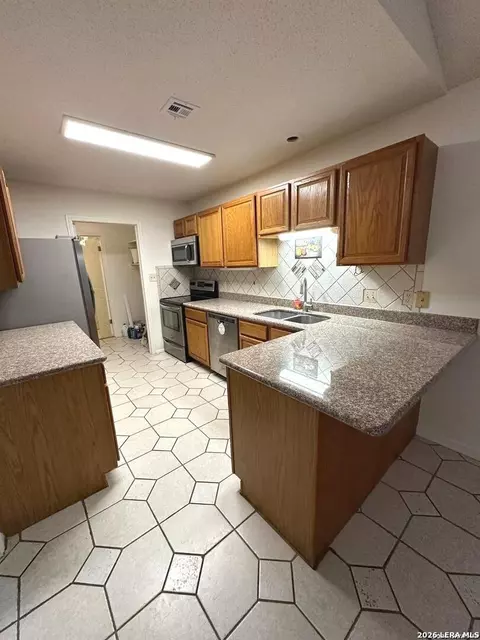 Kitchen - 336 Sollock Dr, Devine, TX 78016 photo 2 of 2