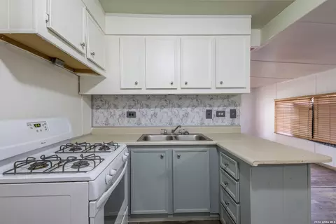 Kitchen - 703 S Baylor, Cotulla, TX 78014 photo 1 of 3