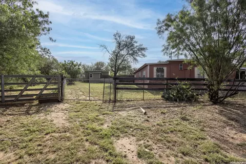 Exterior - 703 S Baylor, Cotulla, TX 78014 photo 7 of 11