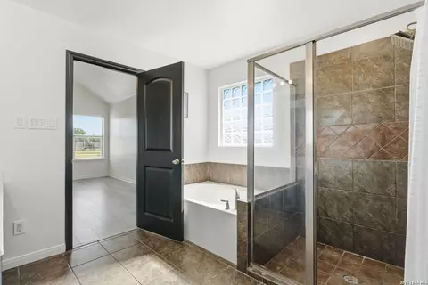 Bath - 1860 County Road 6710, Lytle, TX 78052 photo 2 of 3