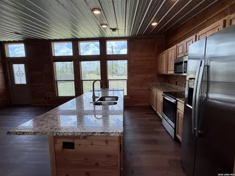 Kitchen - 7002 County Road 4514, Devine, TX 78016 photo 2 of 4