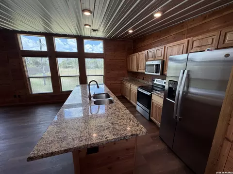 Kitchen - 7002 County Road 4514, Devine, TX 78016 photo 3 of 4
