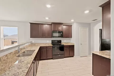 Kitchen - 15246 Walcott Rdg, Von Ormy, TX 78073 photo 2 of 2