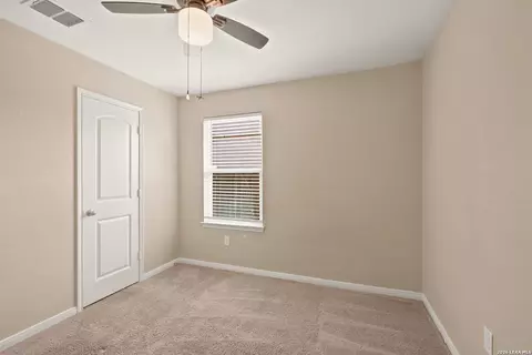 Bedroom - 15246 Walcott Rdg, Von Ormy, TX 78073 photo 2 of 5