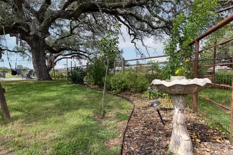 Exterior - 235 County Road 7712, Devine, TX 78016 photo 7 of 12