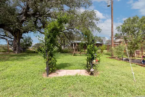 Exterior - 235 County Road 7712, Devine, TX 78016 photo 5 of 12