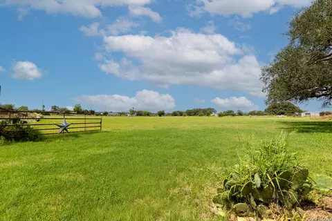 Exterior - 235 County Road 7712, Devine, TX 78016 photo 3 of 12