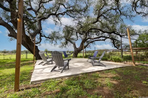 Exterior - 235 County Road 7712, Devine, TX 78016 photo 9 of 12