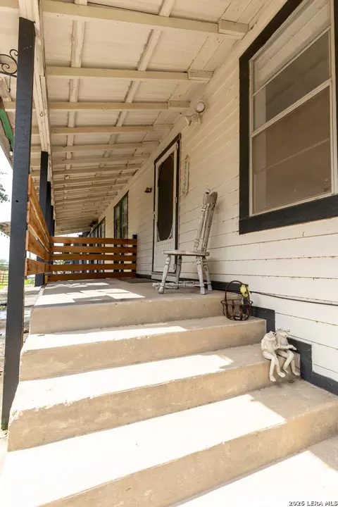 Exterior - 235 County Road 7712, Devine, TX 78016 photo 11 of 12