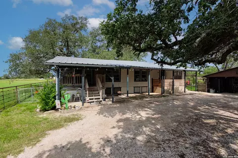 Exterior - 235 County Road 7712, Devine, TX 78016 photo 1 of 12