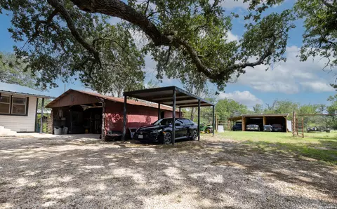 Exterior - 235 County Road 7712, Devine, TX 78016 photo 10 of 12