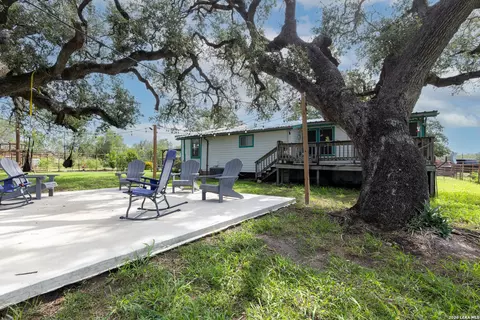 Exterior - 235 County Road 7712, Devine, TX 78016 photo 8 of 12