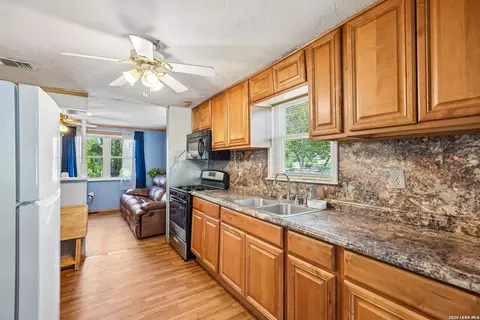 Kitchen - 619 Webb Ave, Devine, TX 78016 photo 1 of 2