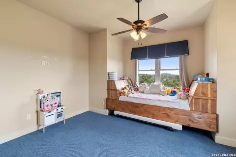 Bedroom - 241 E Lynx Cv, Blanco, TX 78606 photo 7 of 10